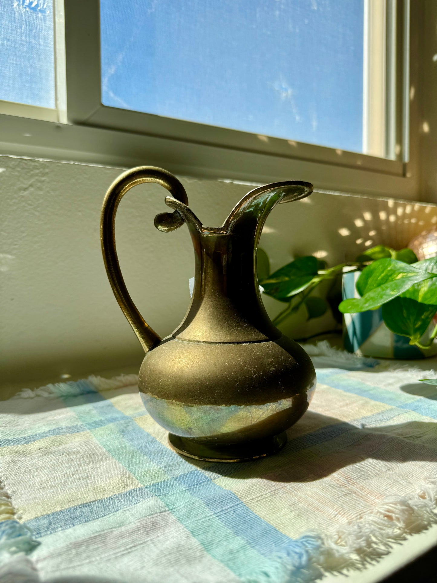 Small, Brass pitcher